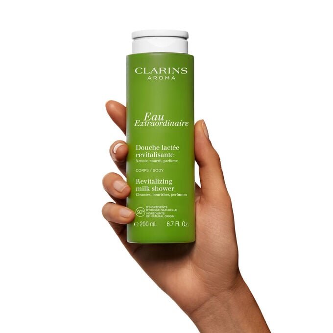 Leche de ducha revitalizante Eau Extraordinaire: gel de baño limpiador e hidratante para el cuerpo